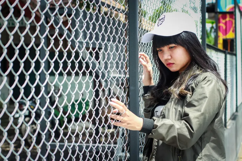 Crowned by Culture: How the Oversized Cap Became America's Most Loaded Status Symbol