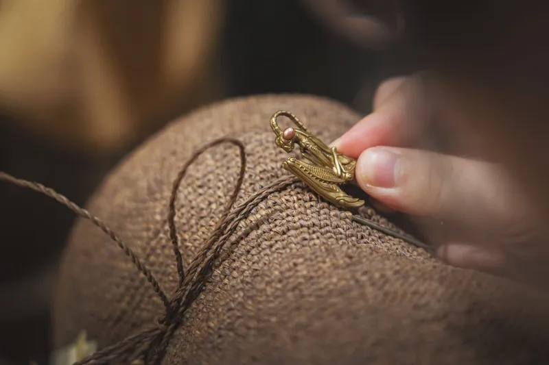 Hand-Stitched and One-of-One: Meet the Artists Turning Oversized Caps Into Wearable Masterpieces